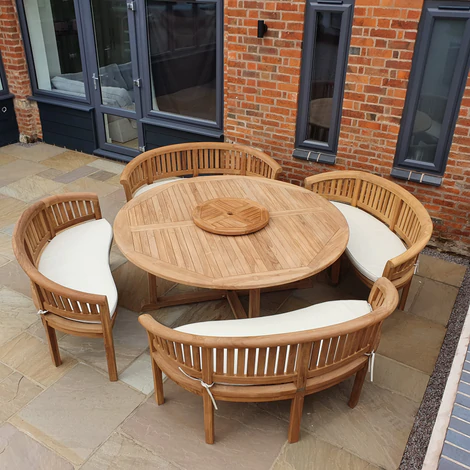 Teak garden dining set. 1.8m “Titan” round table, 4 bowwood style seats